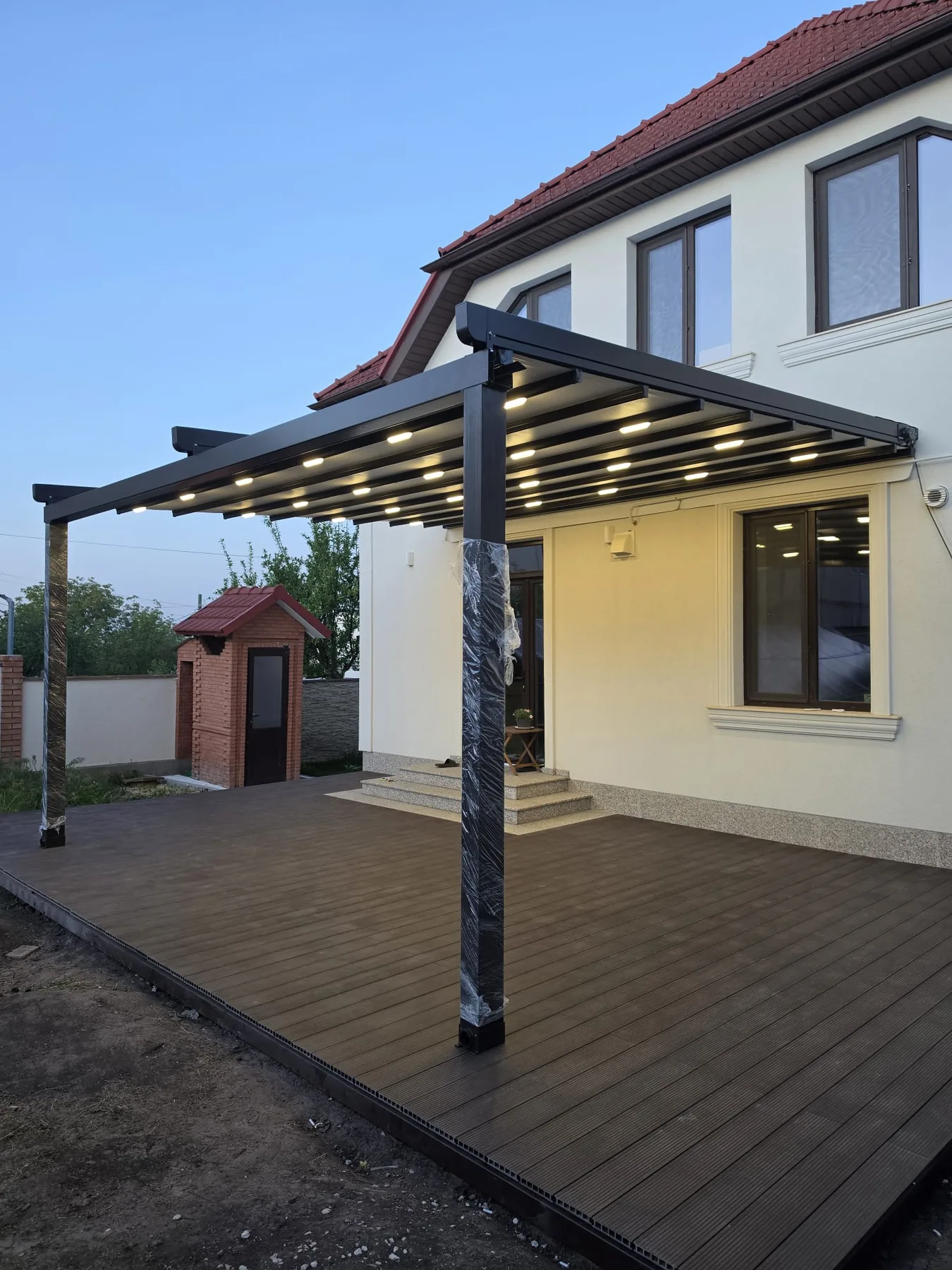 Retractable pergola roof installation 9