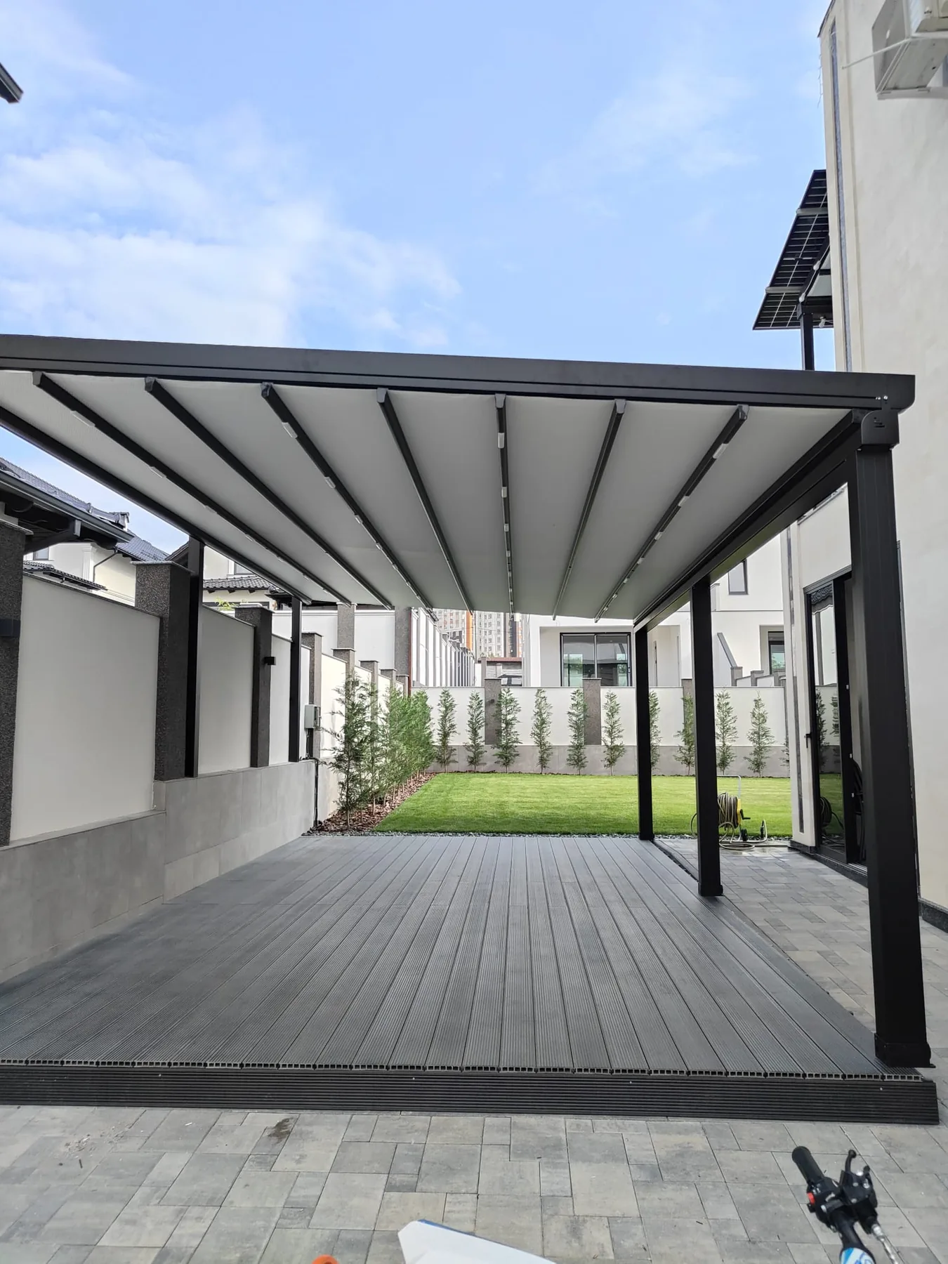 Retractable pergola roof installation 12